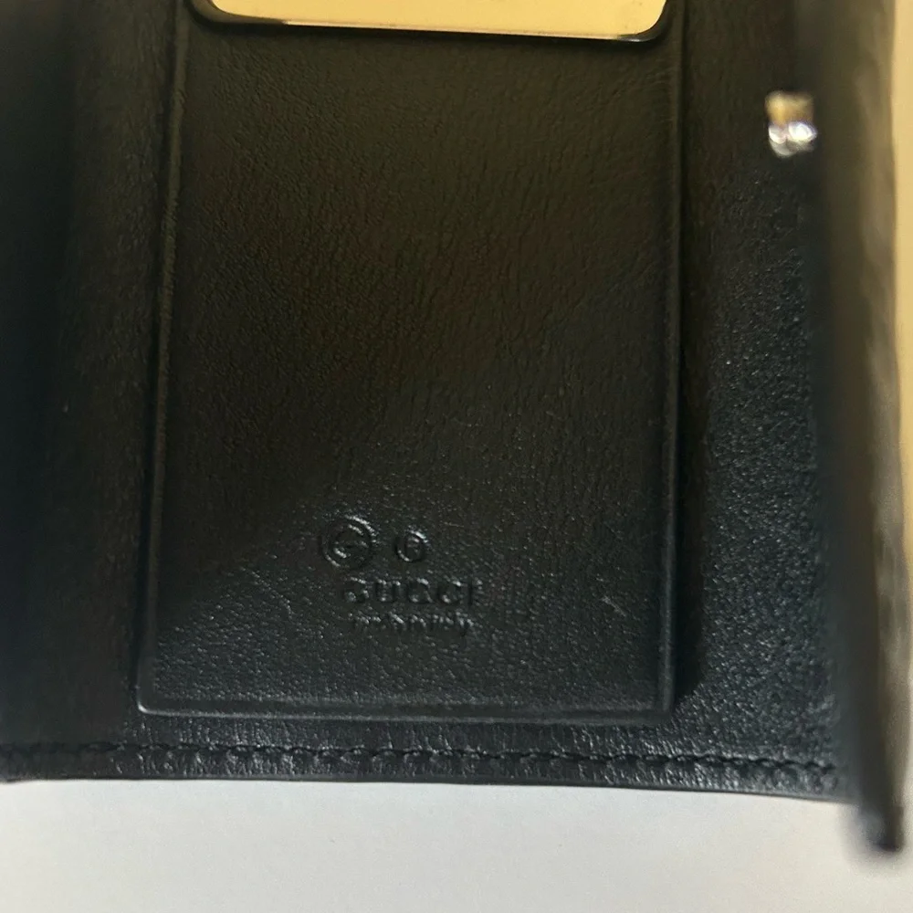 Gucci Black Microguccisima GG Logo Embossed Front closure Leather 6 Key Holder